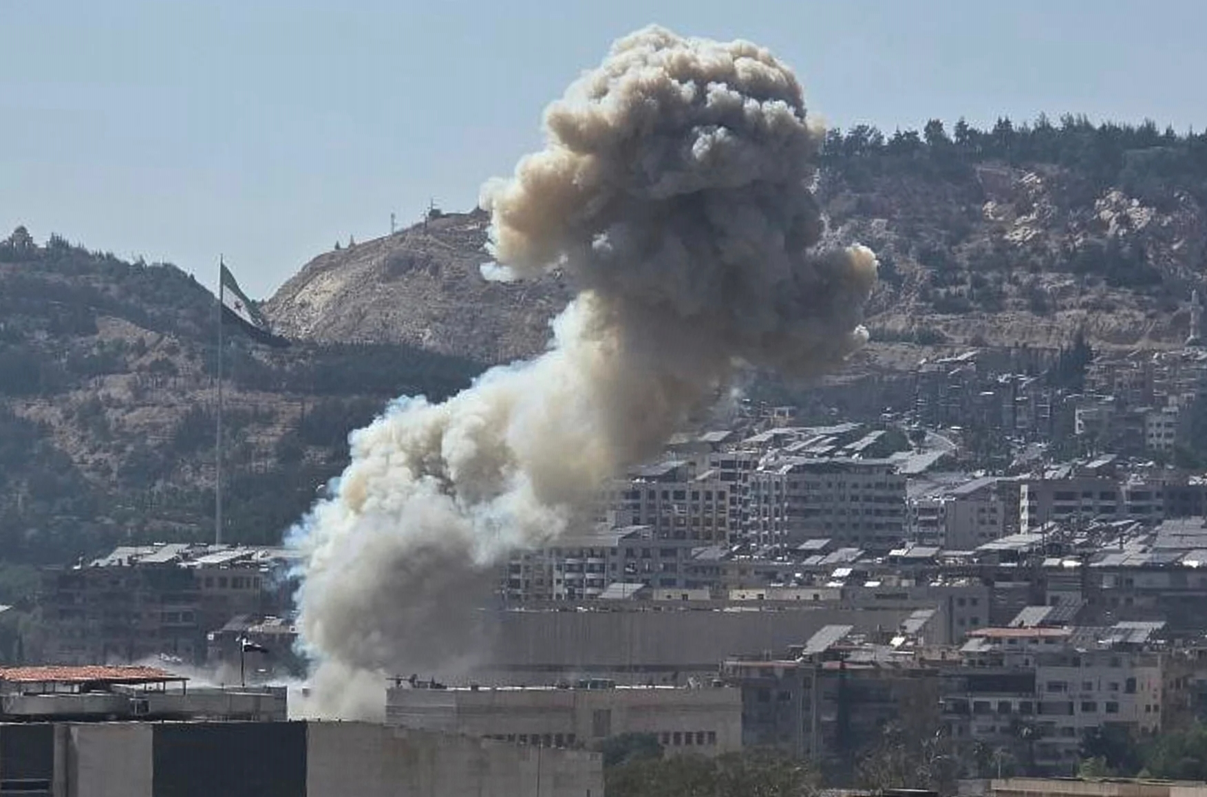 Удар Израиля по Минобороны Сирии во время летних столкновений правительственных сил с друзами. Фото: SANA