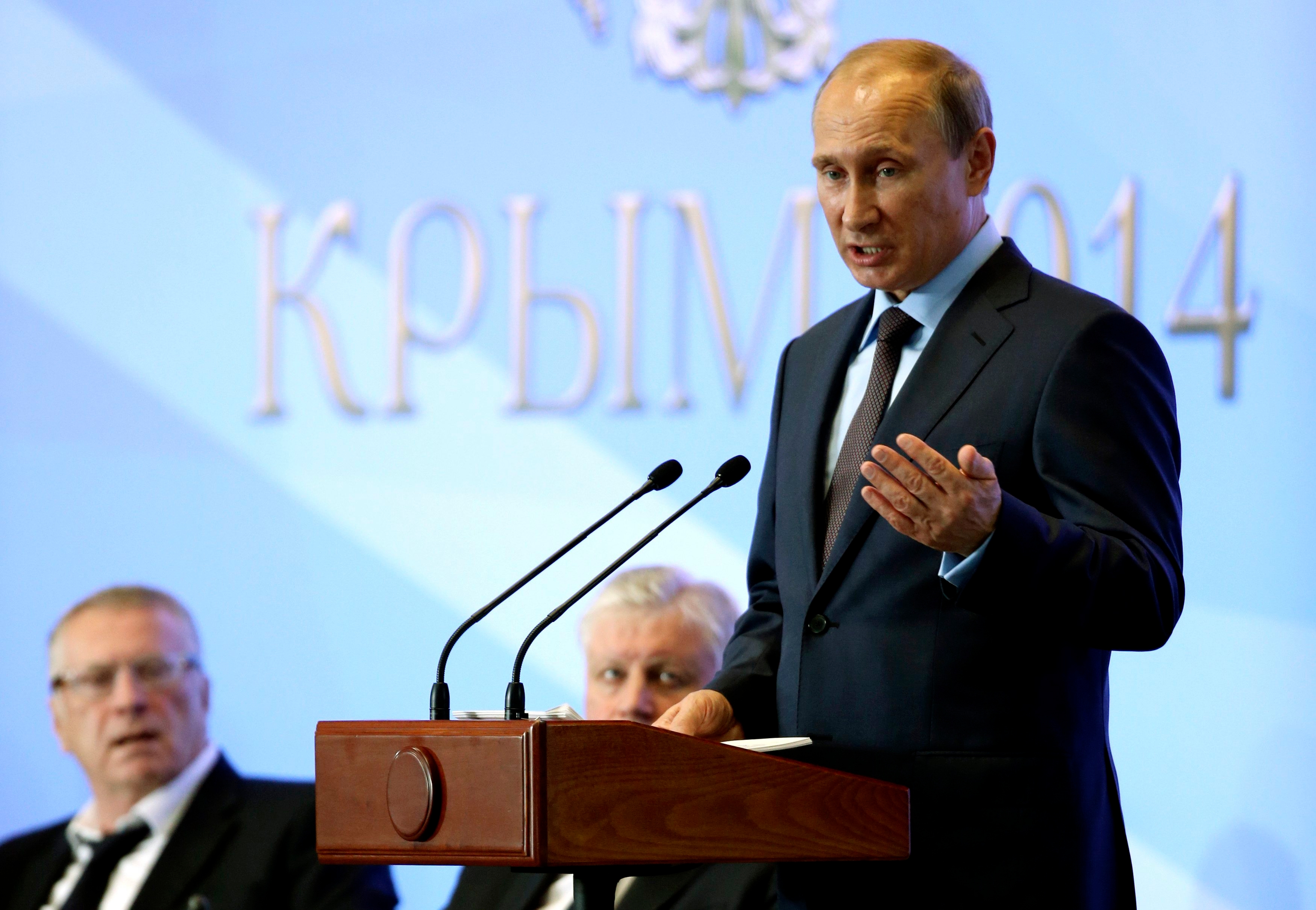 Russian President Vladimir Putin delivers a speech during a meeting with deputies of the Russian Parliament and other politicians and officials near Yalta